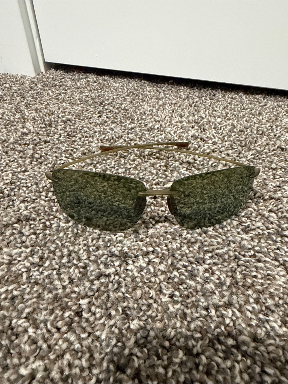 Maui Jim Rimless Sunglasses with Green Lenses and Gold Temples